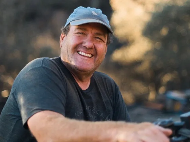 Jim Regusci sitting on a tractor